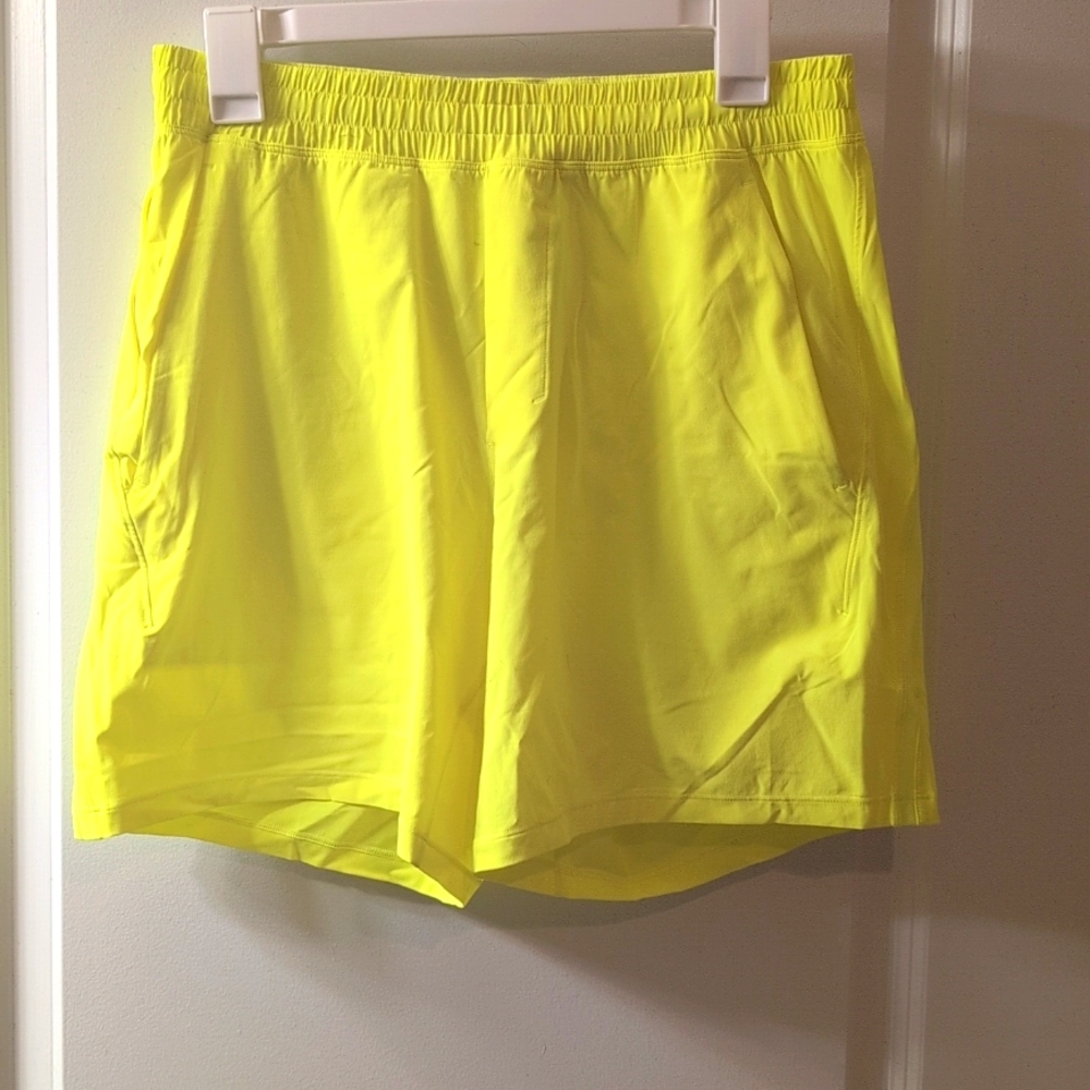 Lululemon pace breaker shorts. Highlighter yellow. Medium